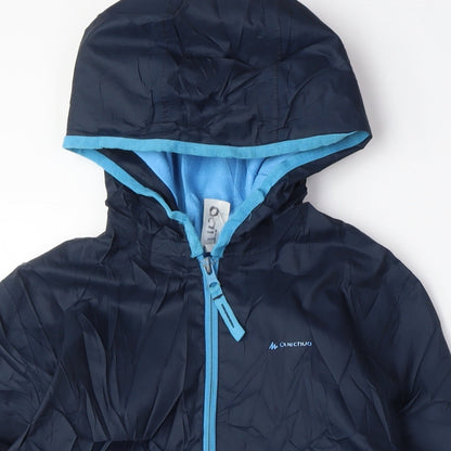Close-up detail of Quechua boys’ black anorak coat, size 12, years zip
