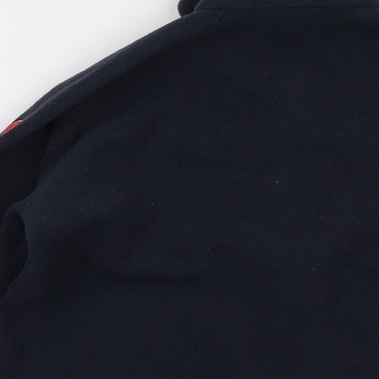 Brand and care label for Tribord boys’ blue jacket, size 14, years zip