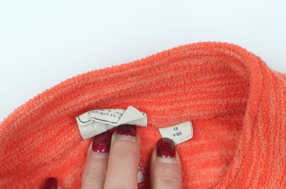 Close-up detail of Warehouse girls’ orange track jacket - 13 years