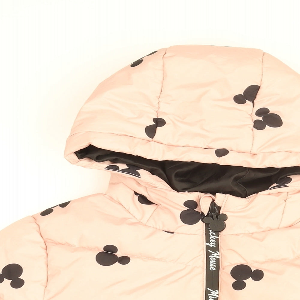 Close-up detail of Disney girls’ pink geometric puffer jacket coat, size 10-11, years zip - mickey mouse