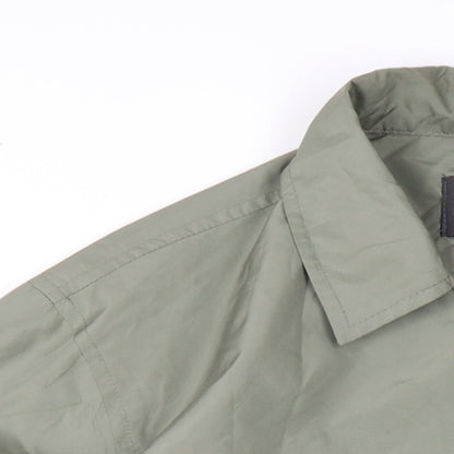 Close-up detail of French Connection men’s green jacket, size S, snap