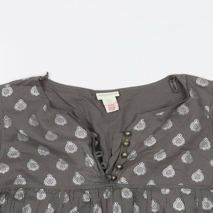 Close-up detail of Monsoon girls’ grey geometric cotton basic blouse, size 10-11, years v-neck button