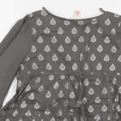 Brand and care label for Monsoon girls’ grey geometric cotton basic blouse, size 10-11, years v-neck button