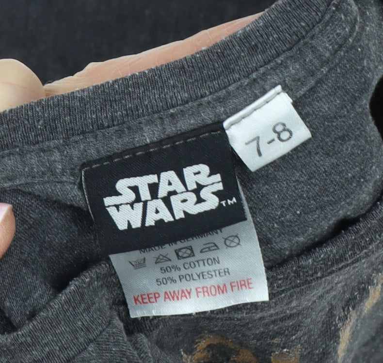 Brand and care label for Star Wars boys’ grey mandalorian t-shirt 7-8 years