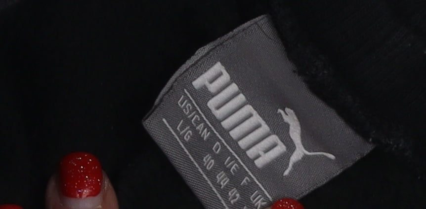Close-up detail of Puma Women's Black Jogger Trousers, size 12, - Gym Ready