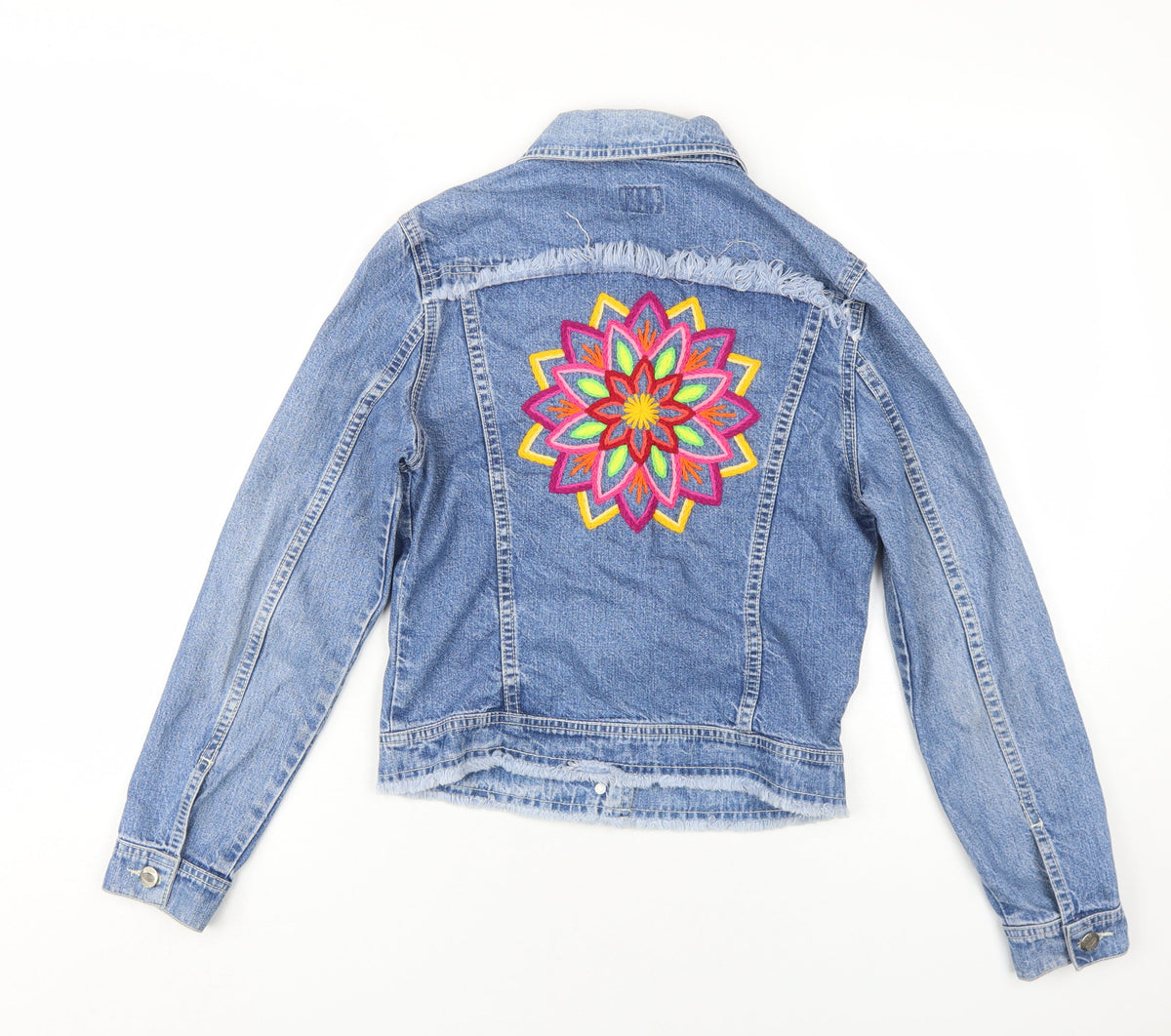 Back view of Cacao girls’ blue denim jacket, size 16, embroidered fringed