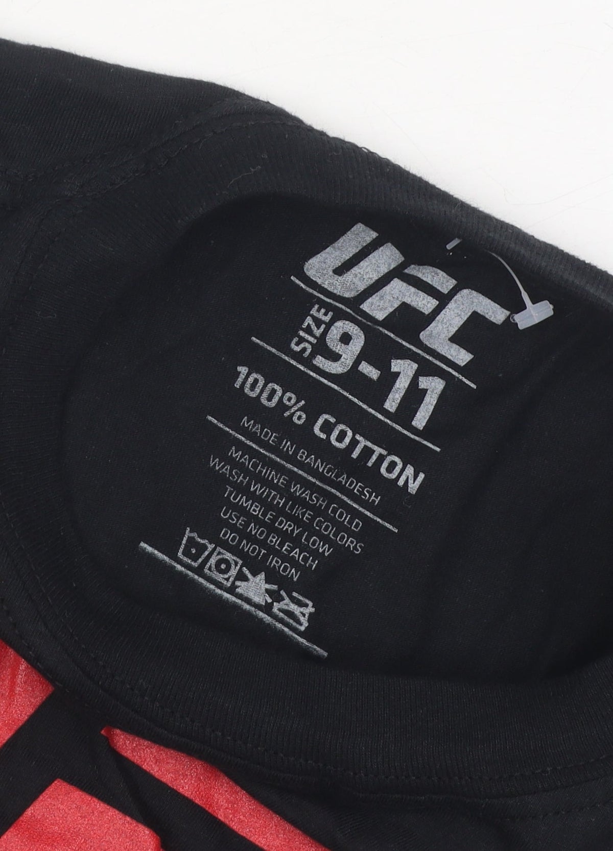 Close-up detail of UFC boys’ black graphic t-shirt 9-10 years casual sports
