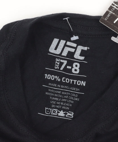Close-up detail of UFC boys’ black cotton t-shirt 7-8 years sports logo