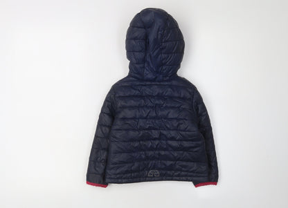 Back view of Decathlon girls’ blue puffer jacket 2-3 years hooded lightweight