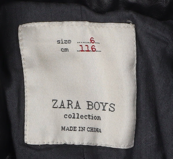 Close-up detail of Zara boys’ black suit jacket 6 years wool herringbone classic