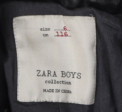 Close-up detail of Zara boys’ black suit jacket 6 years wool herringbone classic