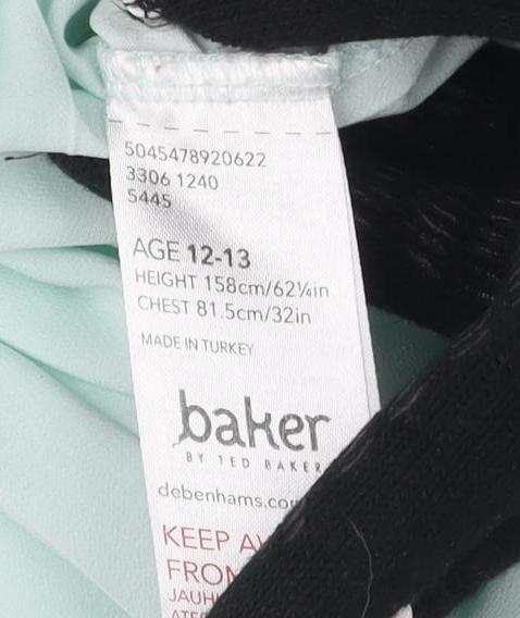 Close-up detail of Baker by Ted Baker girls’ green tunic blouse 12-13y, ruffle sleeves