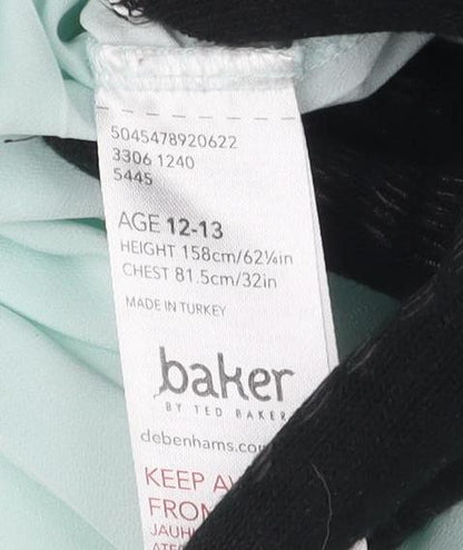 Close-up detail of Baker by Ted Baker girls’ green tunic blouse 12-13y, ruffle sleeves