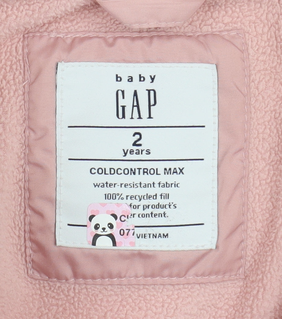 Close-up detail of Gap girls’ pink puffer jacket, 2 years, hooded, quilted