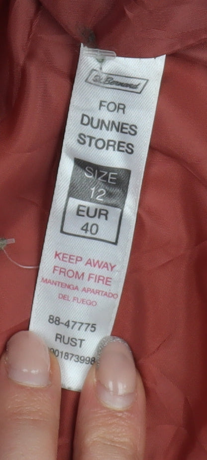 Close-up detail of Dunnes Women's Red Waterproof Rain Coat, size 12