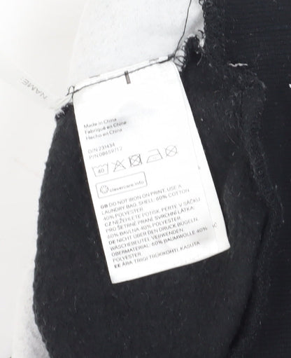 Close-up detail of H&M girls’ black full zip sweatshirt 9-10 years