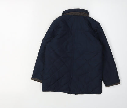 Back view of Regatta boys’ blue quilted jacket 3-4 years winter coat