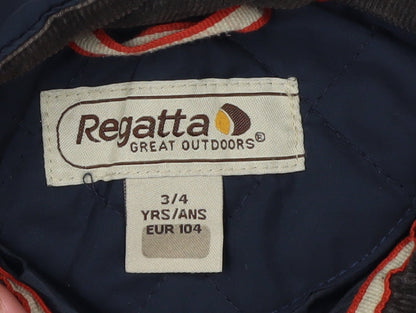 Close-up detail of Regatta boys’ blue quilted jacket 3-4 years winter coat