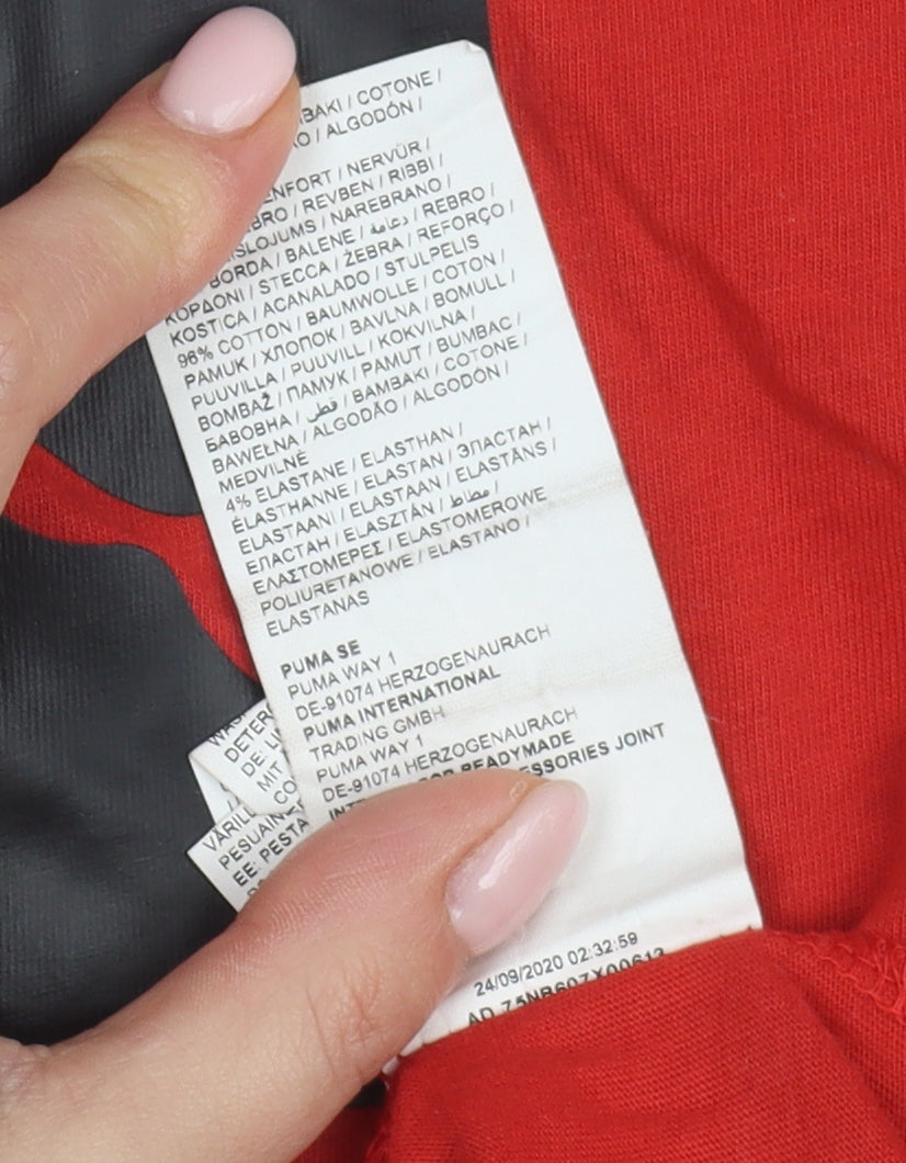 Brand and care label for Puma boys’ red t-shirt, 11-12 years, logo style