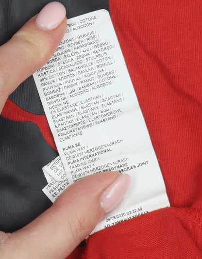 Brand and care label for Puma boys’ red t-shirt, 11-12 years, logo style