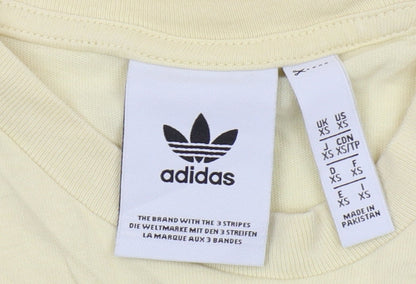 Close-up detail of Adidas Women's Yellow XS Basic T-Shirt