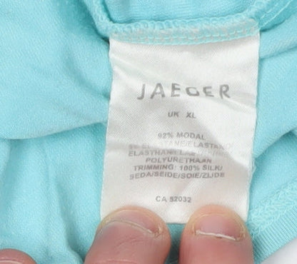 Close-up detail of Jaeger Women's Blue V-Neck Top XL 3/4 Sleeve