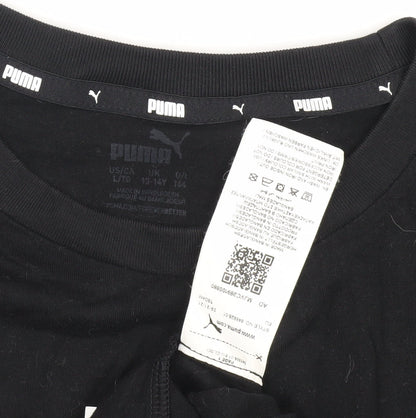 Close-up detail of Puma boys’ black t-shirt, crew neck, logo, size 13-14, years