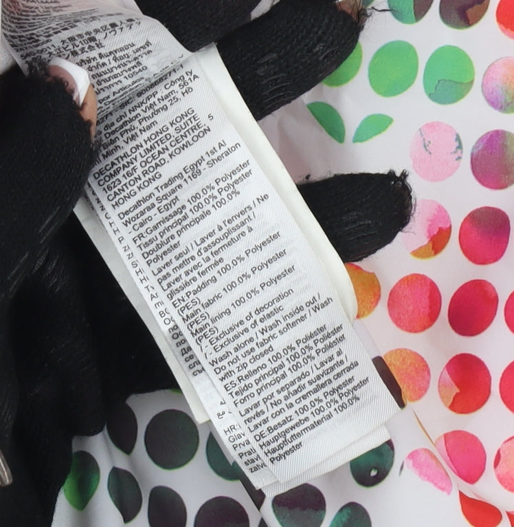 Close-up detail of Decathlon girls’ white puffer jacket, 12 years, hooded