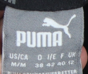 Close-up detail of Puma boys’ black hoodie pullover m casual sportswear