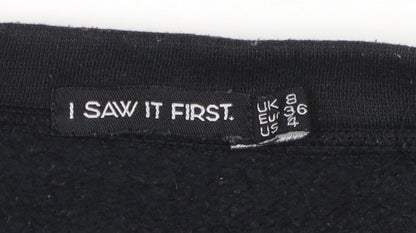 Close-up detail of I Saw It First Women's Black Pullover Sweatshirt, size 8