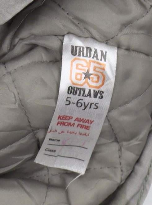 Brand and care label for Urban Outlaws boys’ grey camouflage parka coat 5-6 years