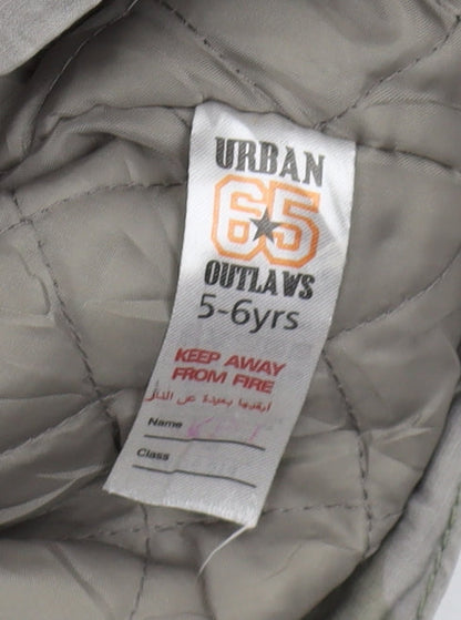 Brand and care label for Urban Outlaws boys’ grey camouflage parka coat 5-6 years