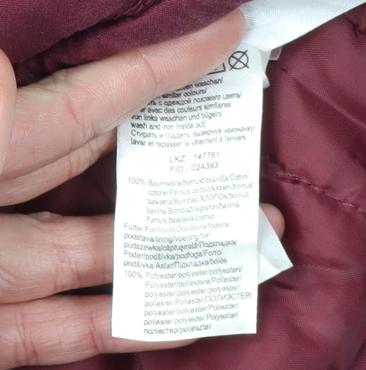 Brand and care label for Arizona girls’ red parka coat with fur trim, size 8, years