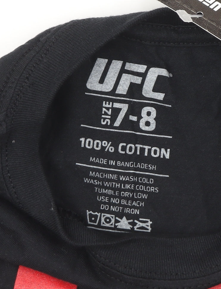 Close-up detail of UFC boys’ black cotton t-shirt 7-8 years with logo, new