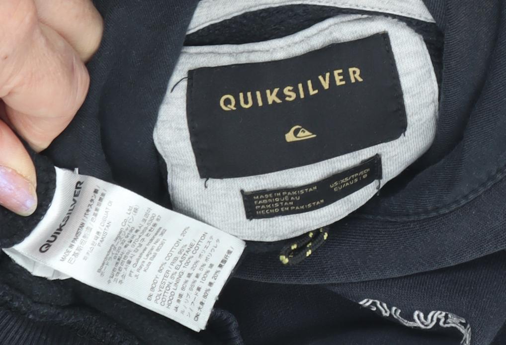 Close-up detail of Quiksilver boys’ black pullover hoodie, size 12