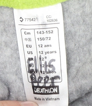 Brand and care label for Quechua boys’ grey fleece jacket 11-12 years