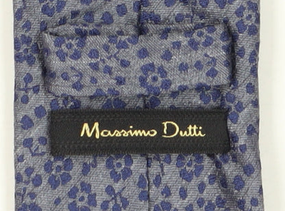 Close-up detail of Massimo Dutti Men's Blue Floral Silk Tie