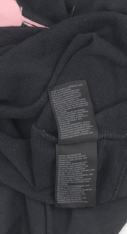 Close-up detail of H&M girls’ black pink panther pullover sweatshirt 14-15 years