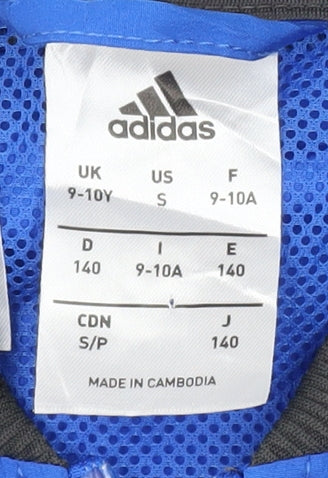 Close-up detail of Adidas boys’ blue black track jacket 9-10y
