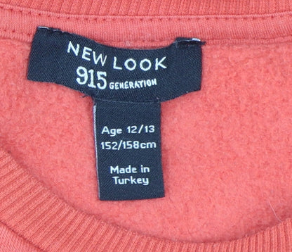 Close-up detail of New Look girls’ red pullover sweatshirt, size 12-13, usa graphic