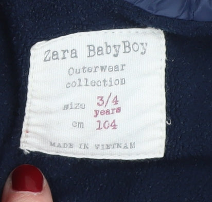 Brand and care label for Zara boys’ red puffer jacket 3-4 years winter hooded