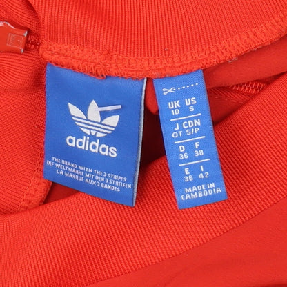 Close-up detail of Adidas Women's Red Basic T-Shirt, size 10