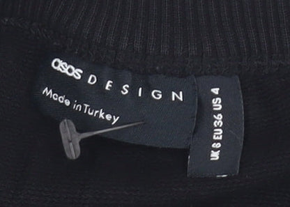 Close-up detail of ASOS DESIGN Black Long Sleeve Cotton Tee, size 8