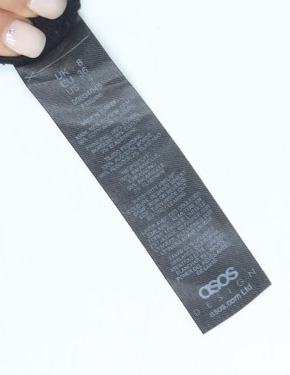 Brand and care label for ASOS DESIGN Black Long Sleeve Cotton Tee, size 8
