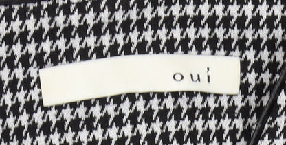Close-up detail of Oui Women's Black Houndstooth Pencil Dress, size 12