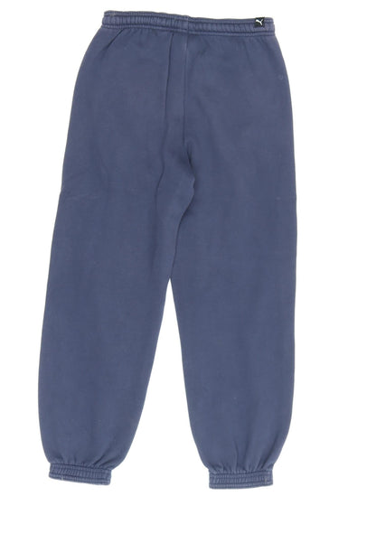 Back view of Puma boys’ blue jogger trousers cotton blend, size 8