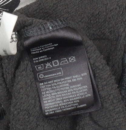 Close-up detail of H&M Harry Potter girls’ black pullover sweatshirt 14 years