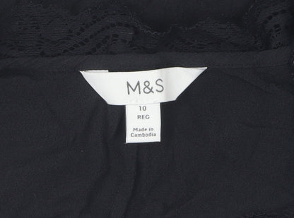 Close-up detail of Marks & Spencer Black Lace Blouse, size 10, Long Sleeve