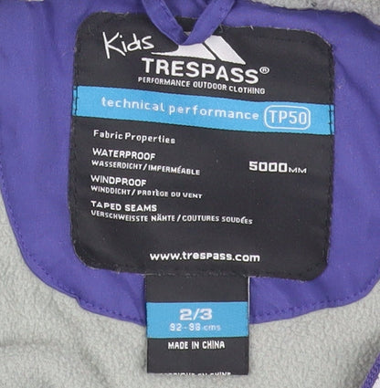 Close-up detail of Trespass girls’ purple puffer jacket 2-3 waterproof