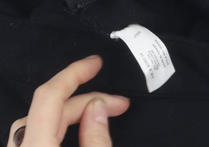 Brand and care label for Kaliko Women's Black Cotton Blend Leggings, size 8